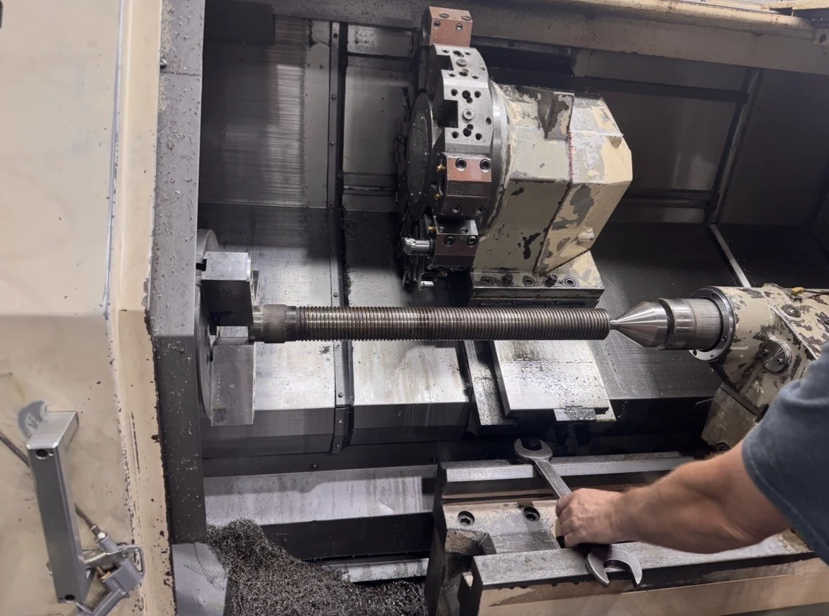 Machining an aircraft jack screw in a CNC lathe